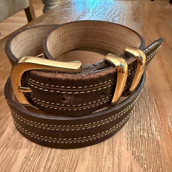 Elegant Brown and Gold Leather Bag with Decorative Stitching - Picture 1 of 4